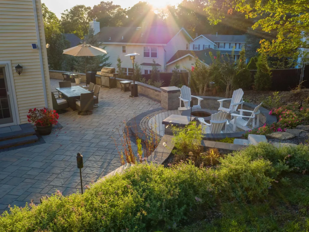 Dual patio with adjoining firepit feature